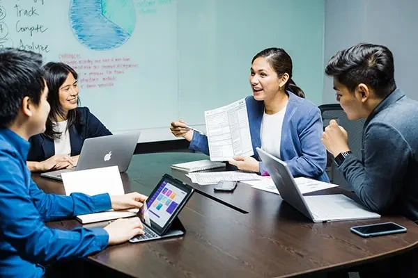 A Philippine team collaborating at work